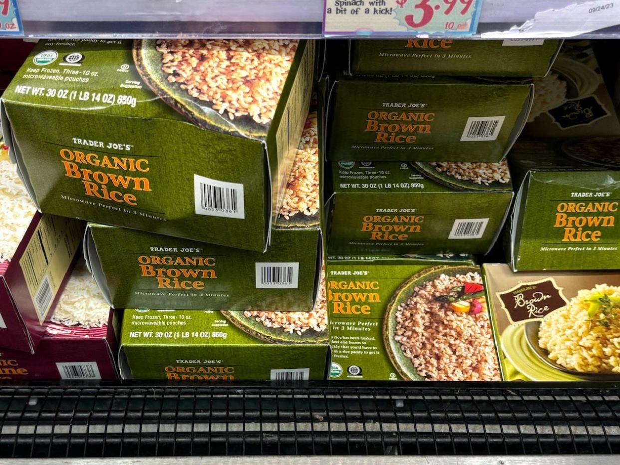 Boxes or Trader Joe's organic brown rice in the frozen section.