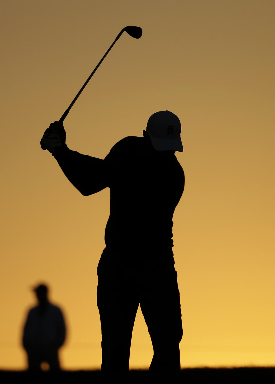 Tiger Woods hits to the second green during the pro-am at the Farmers Insurance Open golf tournament at Torrey Pines Golf Course on Wednesday, Jan. 22, 2014, in San Diego. (AP Photo/Chris Carlson)