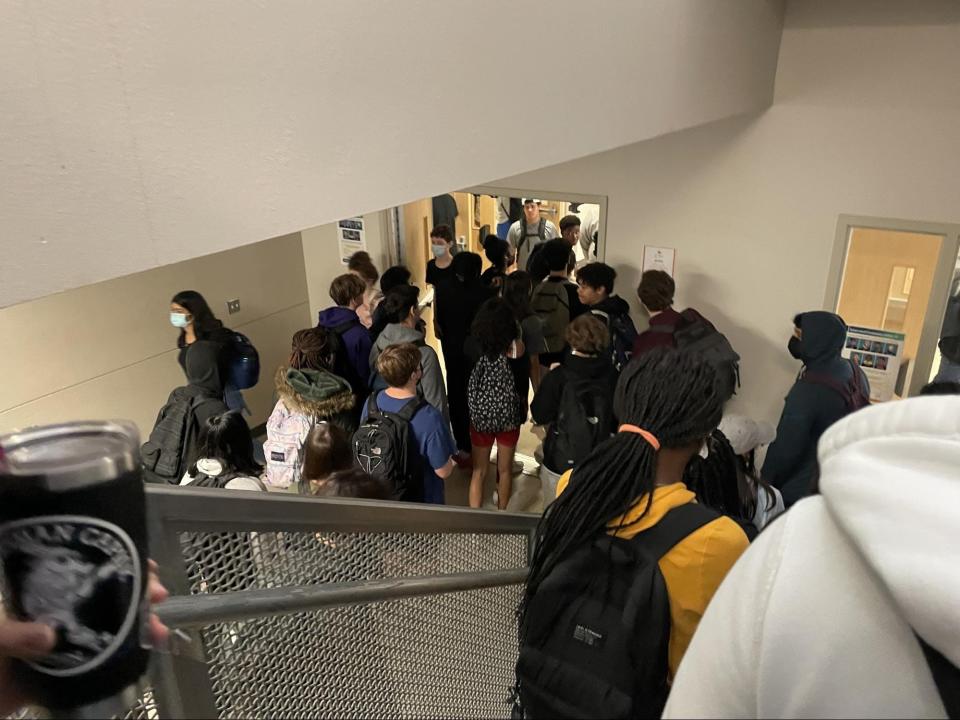 Students crowd the stairwell before a lunch period at Cedar Ridge High School in Round Rock, Texas.