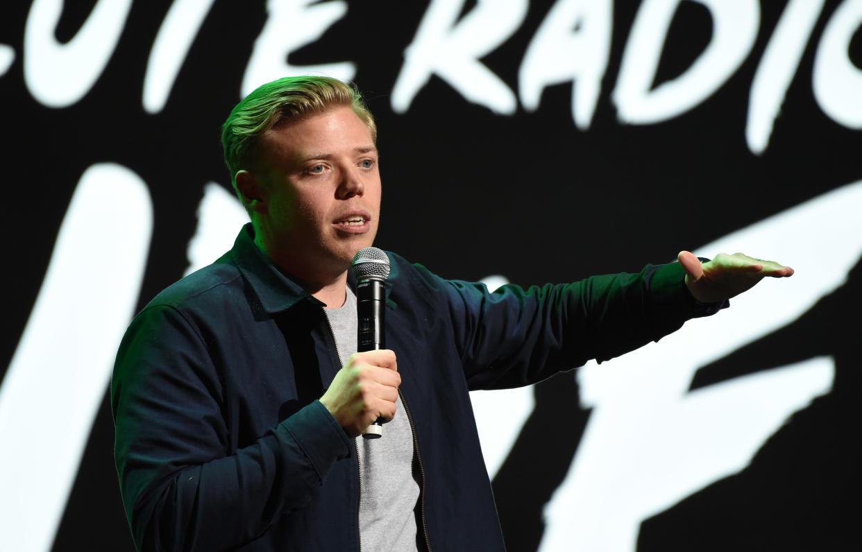 LONDON, ENGLAND - NOVEMBER 25: Rob Beckett performs during  Absolute Radio Live at the London Palladium on November 25, 2018 in London, England. (Photo by Stuart C. Wilson/Getty Images)