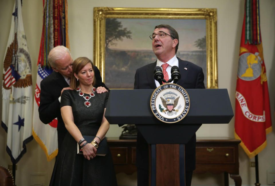 Vice President Biden stood close behind the wife of Defense Secretary Ash Carter at Carter's swearing-in ceremony&nbsp;in 2015. (Photo: Alex Wong/Getty Images)