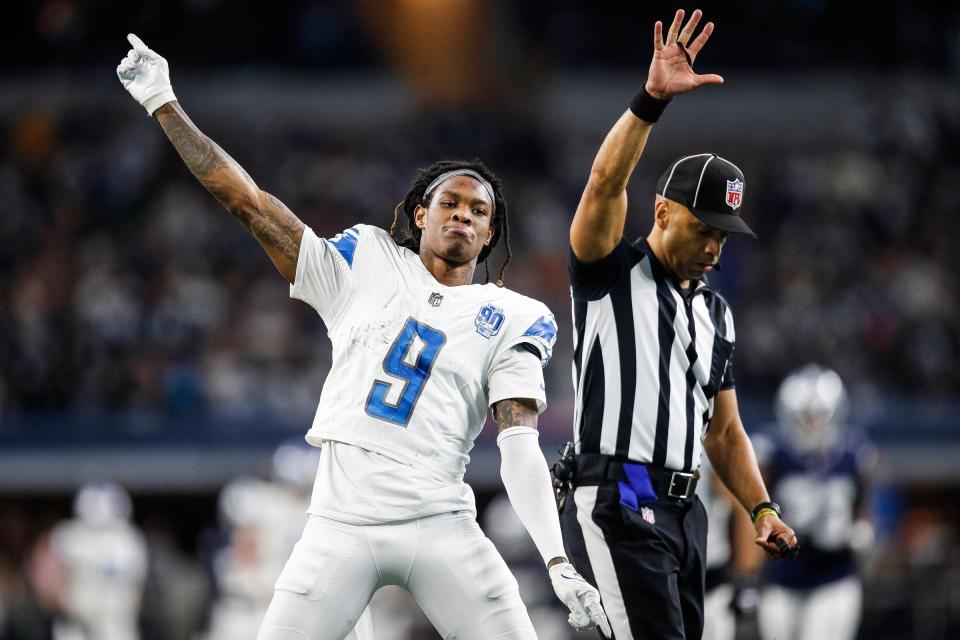 Lions wide receiver Jameson Williams celebrates a first down against the Cowboys during the second half of the Lions' 20-19 loss at AT&T Stadium in Arlington, Texas on Saturday, Dec. 30, 2023.