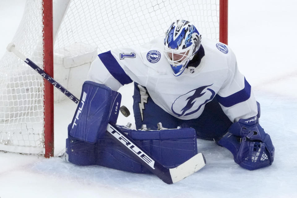 Tampa Bay Lightning goaltender Brian Elliott makes a pad save during the first period of an NHL hockey game against the Chicago Blackhawks Tuesday, Jan. 3, 2023, in Chicago. (AP Photo/Charles Rex Arbogast)