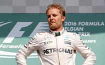 Belgium Formula One - F1 - Belgian Grand Prix 2016 - Francorchamps, Belgium - 28/8/16 - Mercedes' Nico Rosberg of Germany celebrates on the podium after the Belgian F1 Grand Prix. REUTERS/Yves Herman