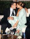 <p>As if they didn't heat up the red carpet enough, the pair got cozy at the <em>Vanity Fair</em> afterparty. </p>