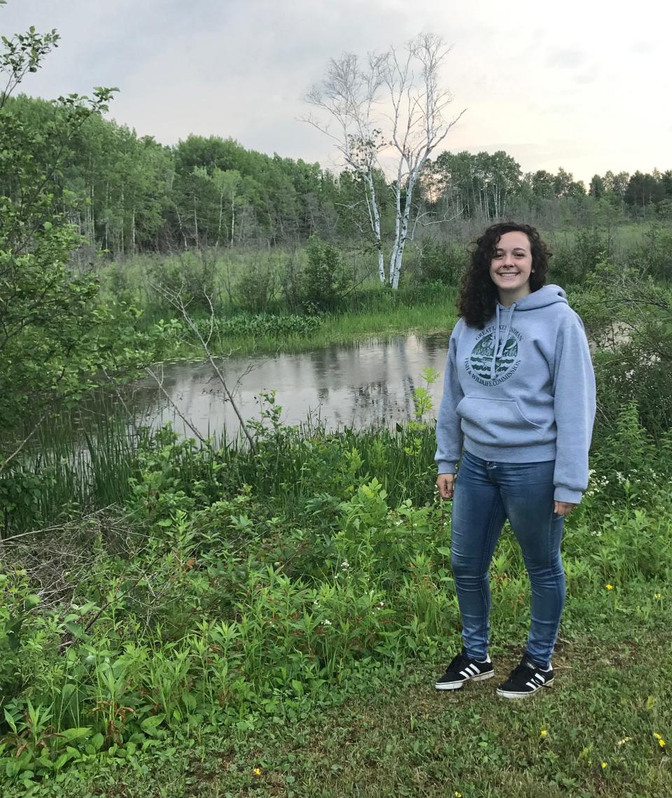 Hannah Arbuckle in front of the Kakagon Slough on Bad River where they harvest our Manoomin (wild rice). Arbuckle says Manoomin in the Ojibwe language means "the good berry", and has many traditional and cultural value to us including being apart of origin story where we were told to settle "where food grows on water". Arbuckle has an internship working for the Great Lakes Indian Fish and Wildlife Commission, located on the Bad River Reservation.