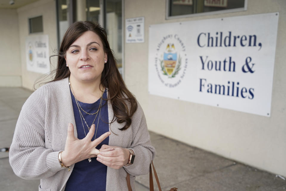 Nico'Lee Biddle, a former foster care kid turned therapist, social worker and policy advocate, talks about the use of data-driven algorithms outside one of the county's Children, Youth and Families offices in North Versailles, Pa., on Friday, Feb. 11, 2022. "This shows when you have technology designed by humans, the bias is going to show up in the algorithms," says Biddle, who has worked for nearly a decade in child welfare, including as a family therapist and foster care placement specialist in Allegheny County. (AP Photo/Keith Srakocic)