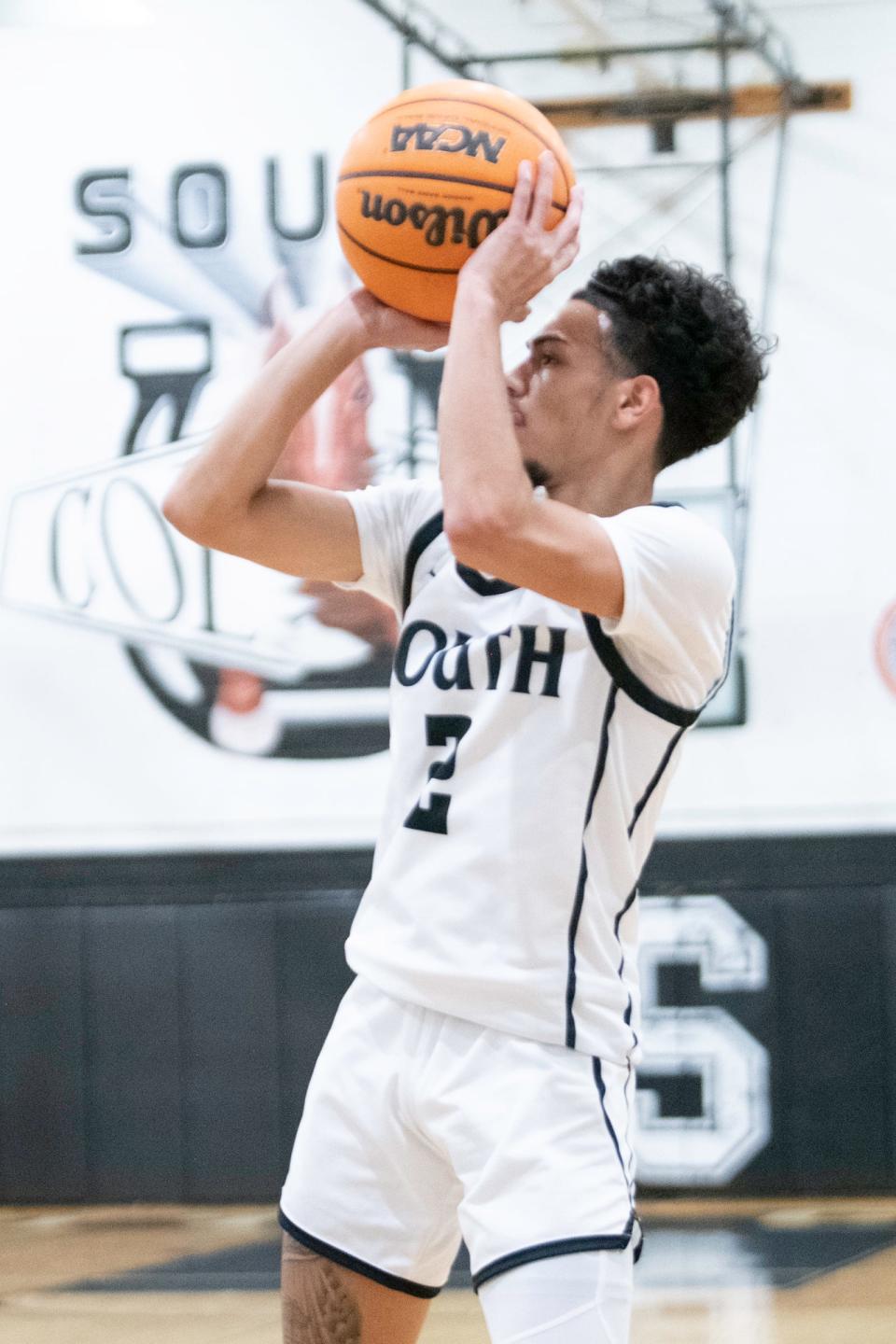 Pueblo South's Ray J. Aragon shoots for two during a game against Pueblo West on Friday, Jan. 27, 2023.