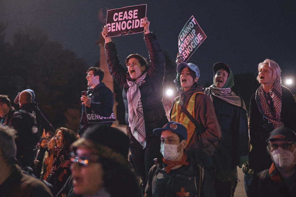 Protesters shout slogans during a pro-Palestinian demonstration demanding a permanent cease-fire in Gaza, near the home of Sen. Chuck Schumer in the Brooklyn borough of New York, Tuesday, April 23, 2024. (AP Photo/Andres Kudacki)