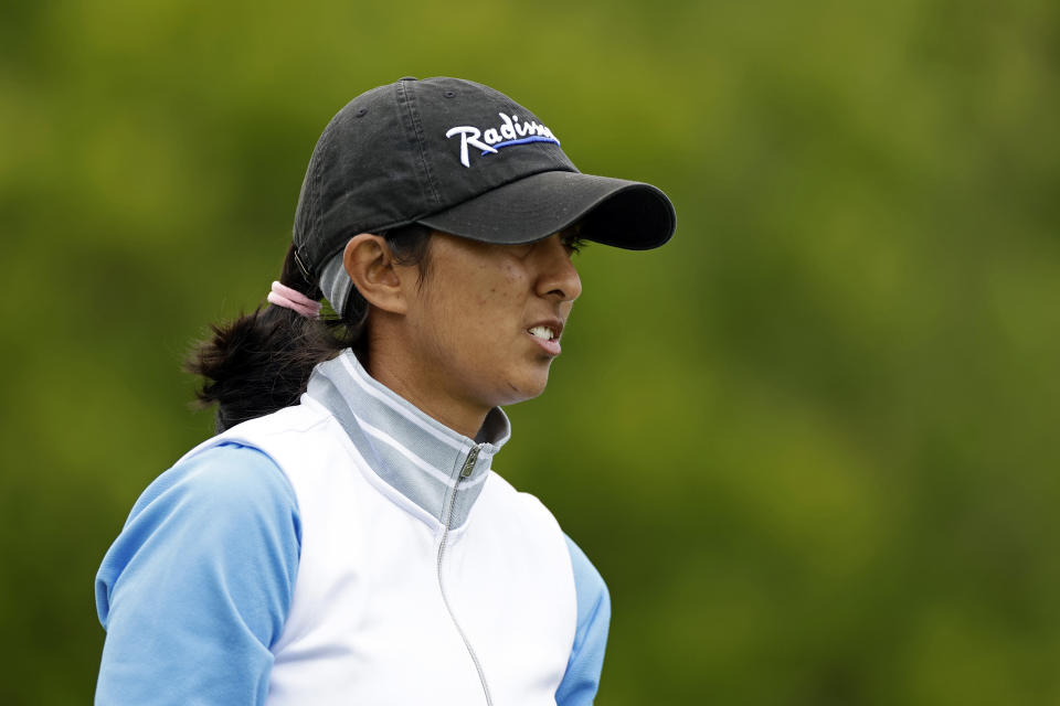 Aditi Ashok, of India, reacts while walking off the second hole tee during the final round of the Mizuho Americas Open golf tournament, Sunday, June 4, 2023, in Jersey City, N.J. (AP Photo/Adam Hunger)