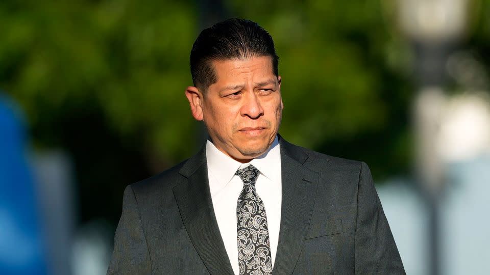 Former school district police officer Adrian Gonzales arrives at the Uvalde County Courthouse in July. - Eric Gay/AP