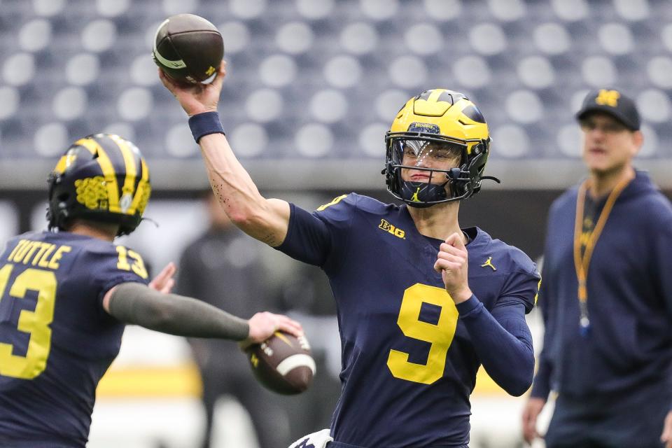 J.J. McCarthy makes a pass during open practice at NRG Stadium in Houston on Jan. 6, 2024.