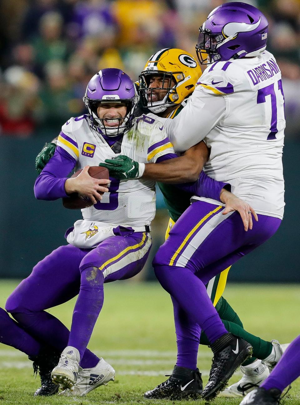 Green Bay Packers defensive tackle Jarran Reed sacks Minnesota Vikings quarterback Kirk Cousins (8) on Sunday, January 1, 2023, at Lambeau Field in Green Bay, Wis. Tork Mason/USA TODAY NETWORK-Wisconsin