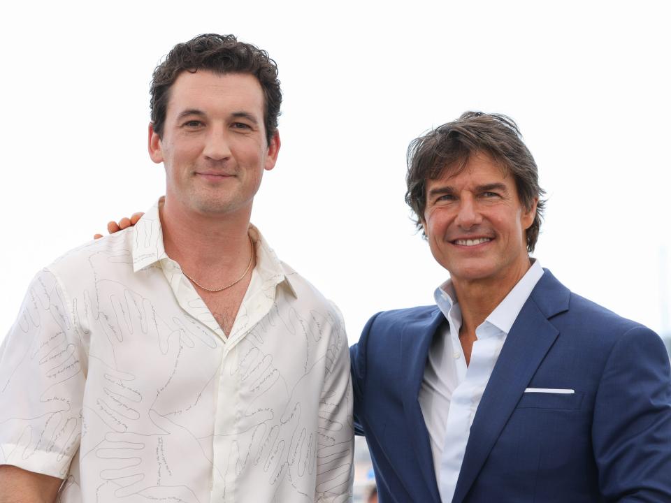 Miles Teller and Tom Cruise attend the photocall of "Top Gun: Maverick"