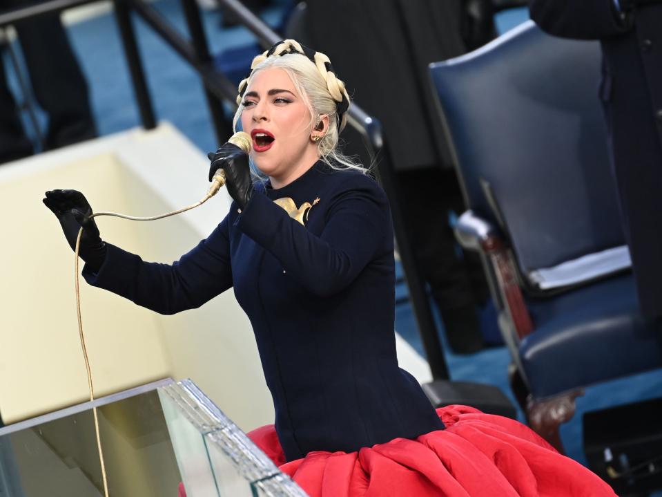 Lady Gaga sings the US national anthem at Joe Biden’s inauguration on 20 January 2021 in Washington, DC (SAUL LOEB/POOL/AFP via Getty Images)