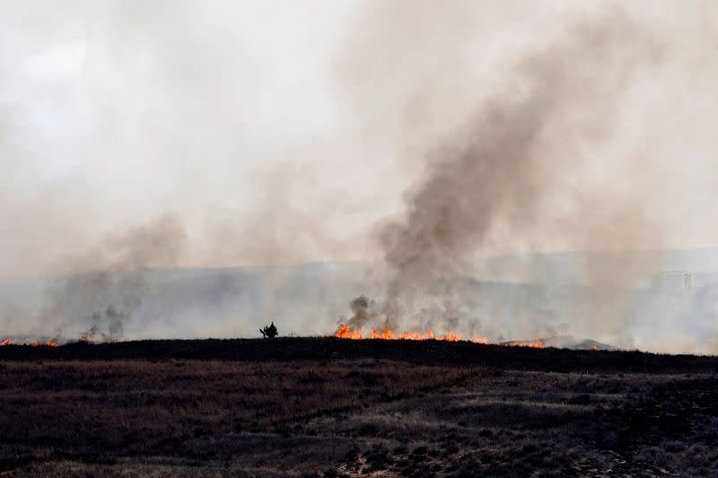 Wildfires burn and prompt evacuations in Texas