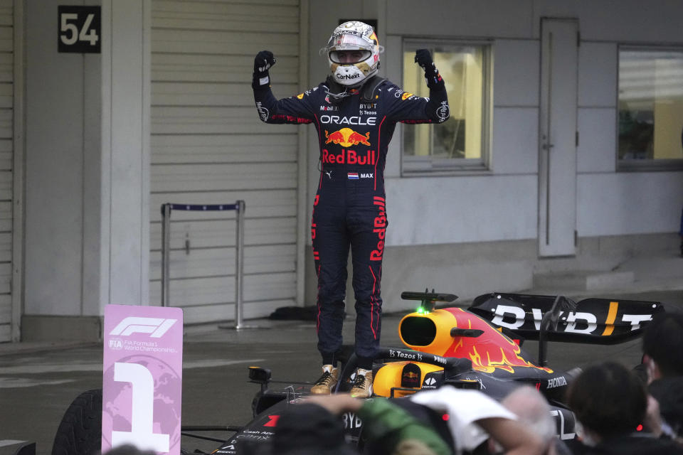 Red Bull driver Max Verstappen of the Netherlands celebrates after winning the Japanese Formula One Grand Prix at the Suzuka Circuit in Suzuka, central Japan, Sunday, Oct. 9, 2022. Verstappen secured second consecutive Formula One drivers' championship. (AP Photo/Toru Hanai)