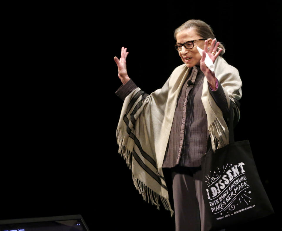 Supreme Court Justice Ruth Bader Ginsburg waves to the crowd before an appearance at Roosevelt University in Chicago in 2017. (AP Photo/Charles Rex Arbogast)