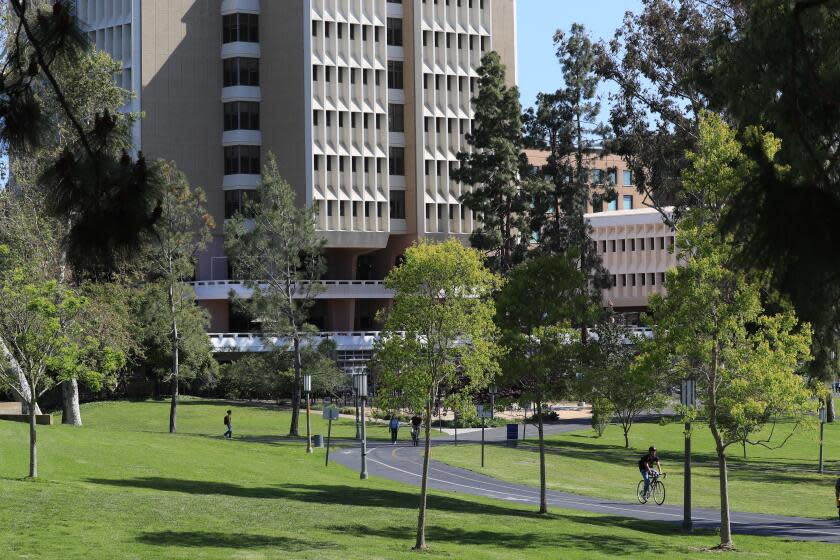 Irvine, CA - May 11: Students and faculty travel through the campus at the University of California-Irvine in Irvine Thursday, May 11, 2023. UC Irvine is boosting student housing construction amid a critical statewide shortage of affordable dorms, which has pushed some students to live in cars, tents or squeezed into cramped quarters with several roommates. UCI received a state housing construction grant, one of the few UC campuses to do so; the funds will help the university offer rents at 30% below market value. (Allen J. Schaben / Los Angeles Times)