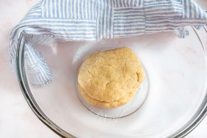 ball of dough in a glass bowl