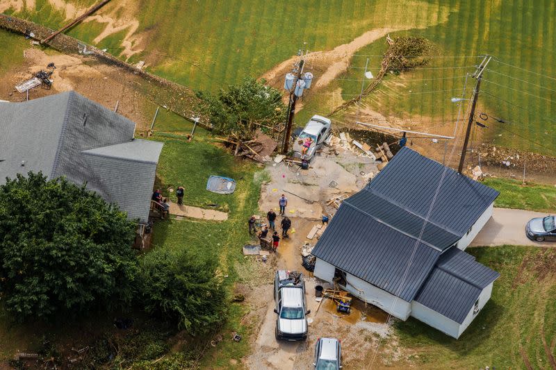 A Kentucky Army National Guard flight crew surveys disaster areas due to flooding