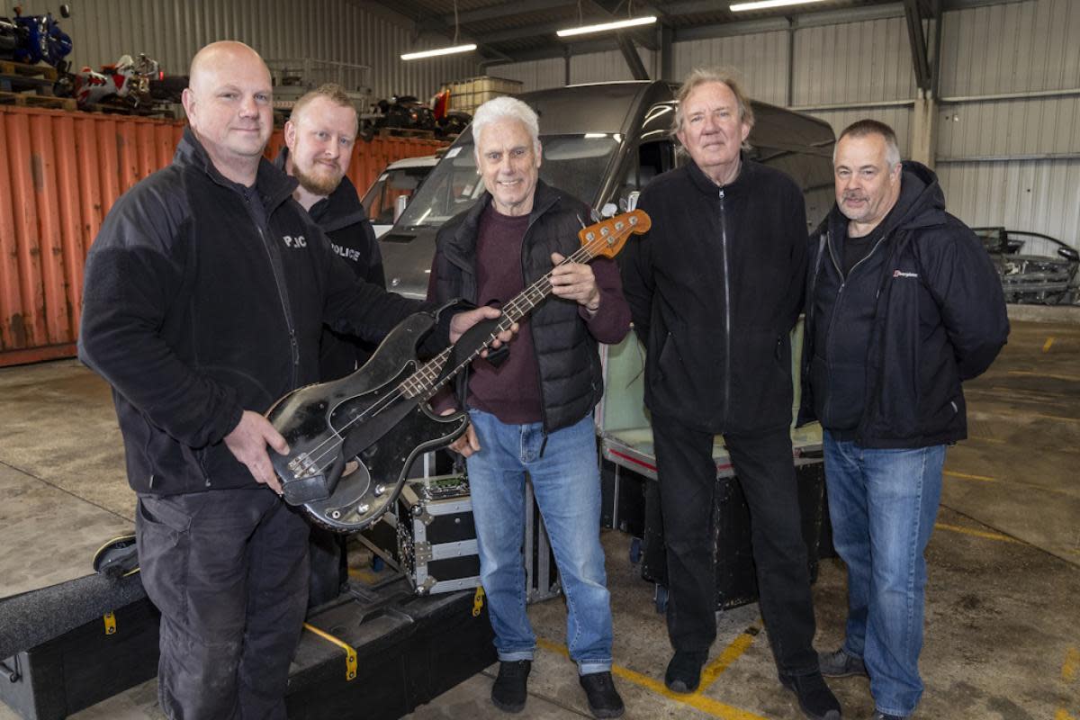 Reunited - Police hand back the irreplaceable guitar to Dr Feel good bass player Phil Mitchell alongside drummer Kevin Morris and tour manager Nic Clacy <i>(Image: Essex Police)</i>