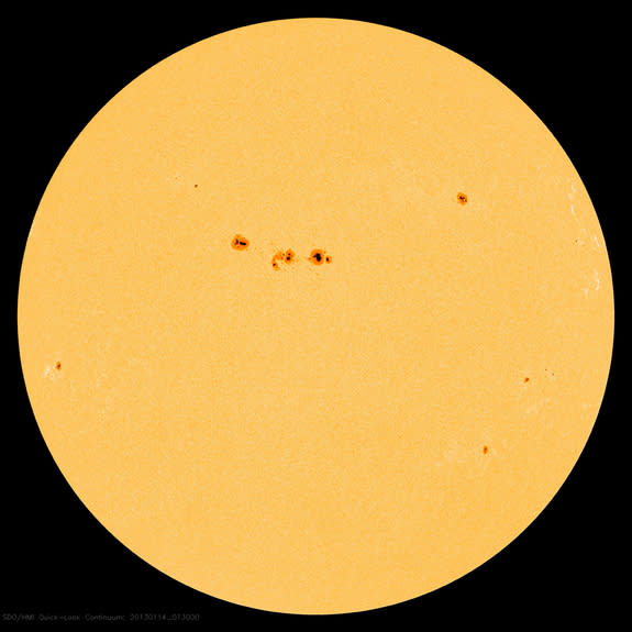 This image from NASA's Solar Dynamics Observatory was captured on Jan. 13, 2013, at 8:13 p.m. EST. At the center sits a large cluster of sunspots, dubbed Active Region 11654.