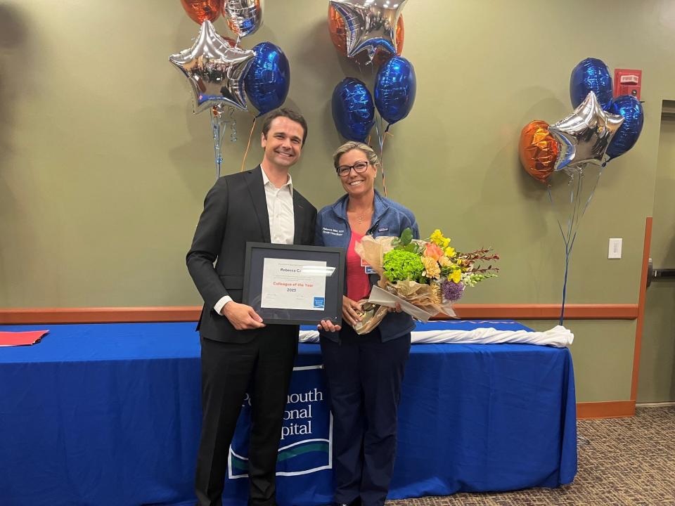 Rebecca Cain, RN, of Dover, the stroke coordinator and nursing support specialist, is the recipient of the 2022 Colleague of the Year Award at Portsmouth Regional Hospital. Pictured with Dean Carucci, market president, HCA New England Healthcare, and CEO of Portsmouth Regional Hospital.