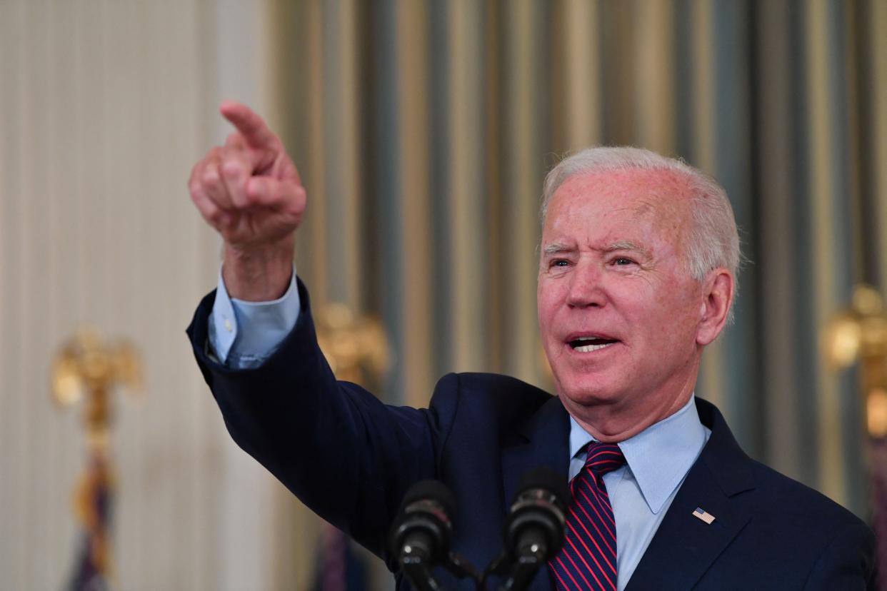 U.S. President Joe Biden gestures as he delivers remarks on the debt ceiling from the State Dining Room of the White House on Oct. 4, 2021, in Washington, DC. President Joe Biden on Monday called Republican opponents "reckless and dangerous" for refusing to join Democrats in raising the U.S. debt limit, putting the world's biggest country at risk of imminent default.