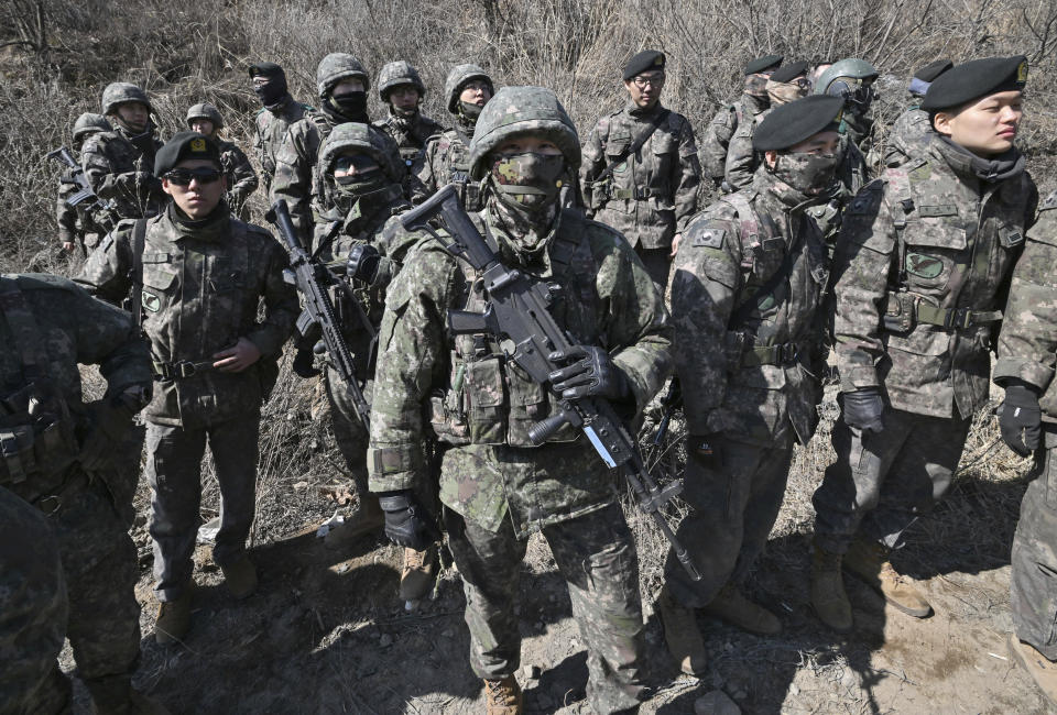 South Korean soldiers gather after a joint live fire exercise at a military training field in Pocheon, South Korea Thursday, March 14, 2024 as part of the annual Freedom Shield joint military exercise between South Korea and the United States. (Jung Yeon-je/Pool Photo via AP)