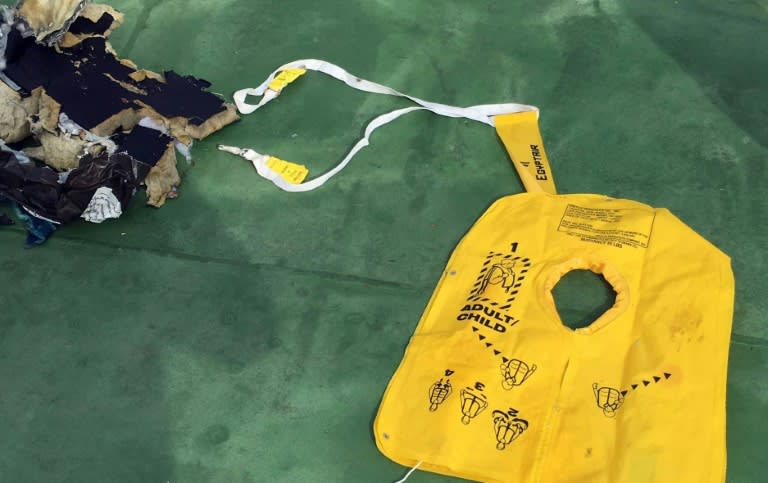 Picture on the official Facebook page of the Egyptian military spokesperson shows a life vest, part of debris found by search teams looking for the EgyptAir flight which plunged into the Mediterranean