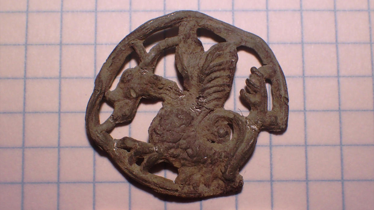  A pilgrim's badge with a symbol of a basilisk. 