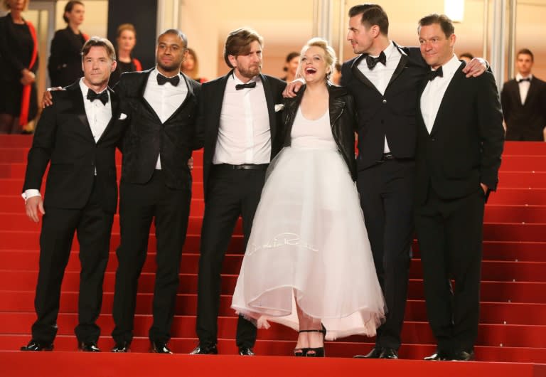 From L: US actor Terry Notary, Danish actor Christopher Læsso, Swedish director Ruben Ostlund, US actress Elisabeth Moss, Danish actor Claes Bang and British actor Dominic West of the film "The Square" at the 70th edition of the Cannes Film Festival