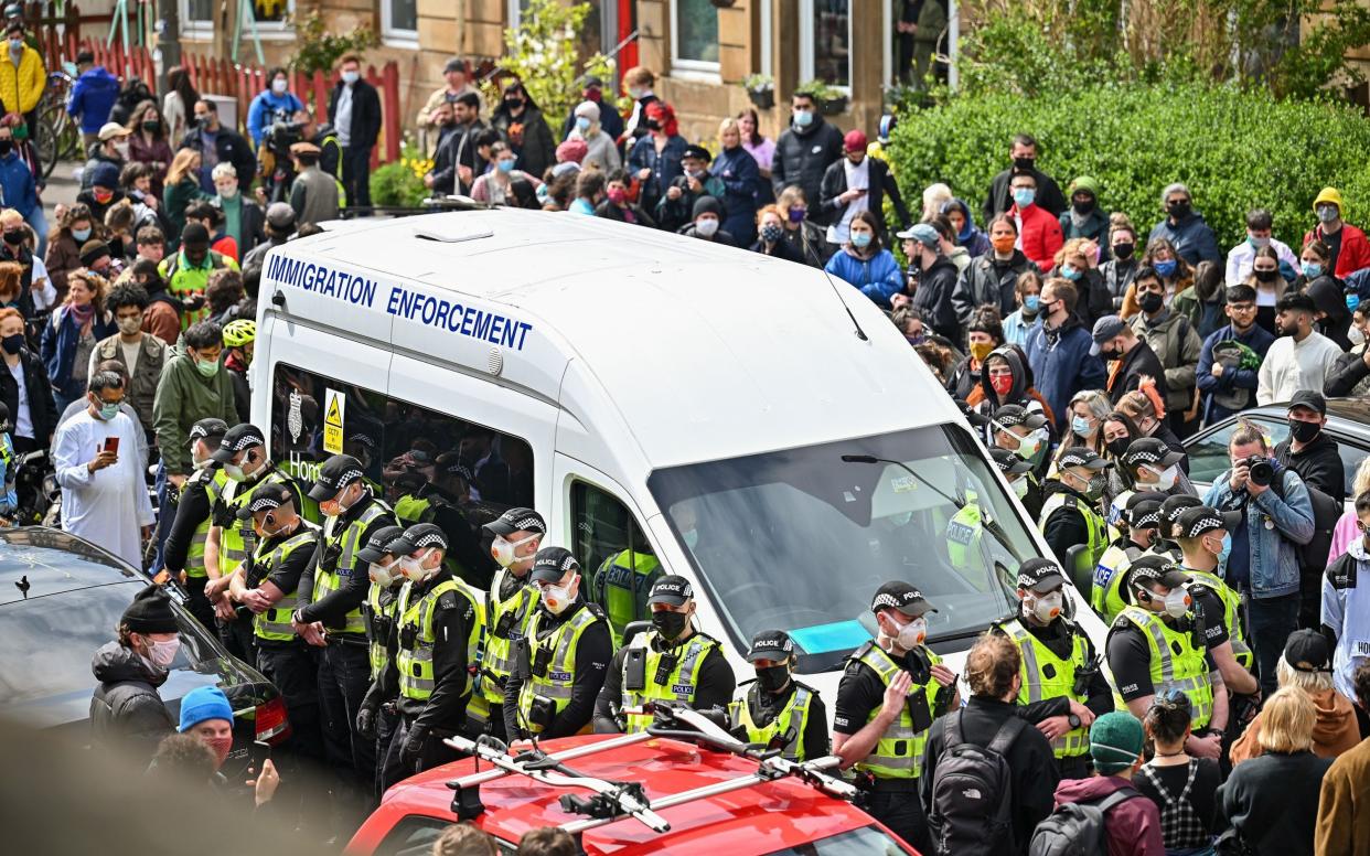 Hundreds of residents, including politicians, took to the streets in Glasgow to protest the attempted removal  - Getty Images Europe