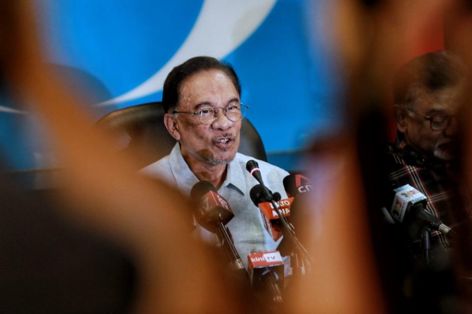 PKR president Datuk Seri Anwar Ibrahim speaks to reporters during a press conference at the party’s headquarters in Petaling Jaya March 13, 2020. — Picture by Ahmad Zamzahuri