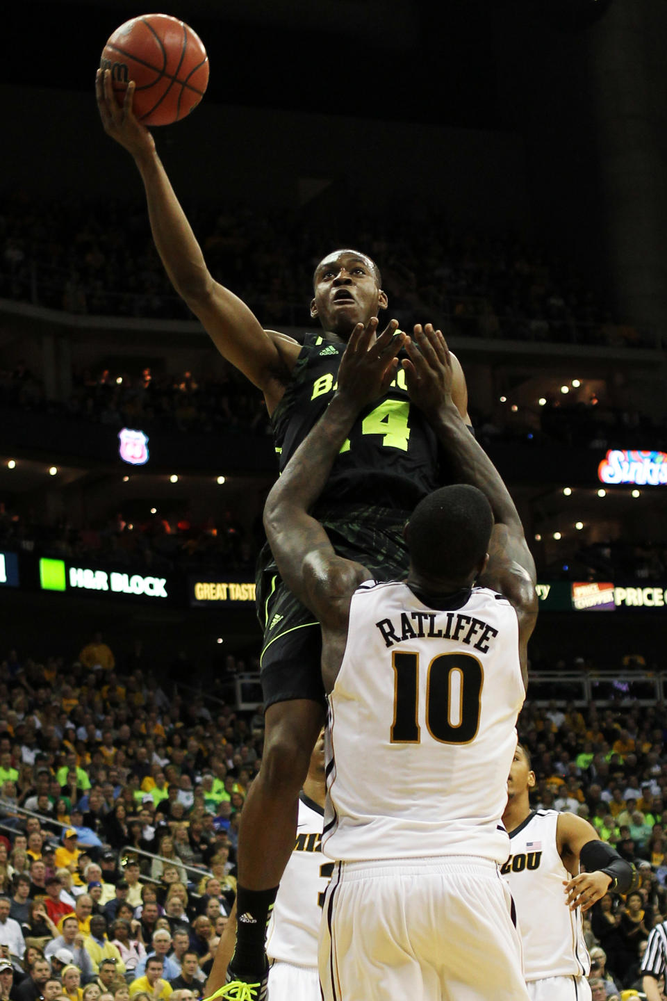 KANSAS CITY, MO - MARCH 10: Deuce Bello #14 of the Baylor Bears shoots over Ricardo Ratliffe #10 of the Missouri Tigers in the second half during the championship game of the 2012 Big 12 Men's Basketball Tournament at Sprint Center on March 10, 2012 in Kansas City, Missouri. (Photo by Jamie Squire/Getty Images)