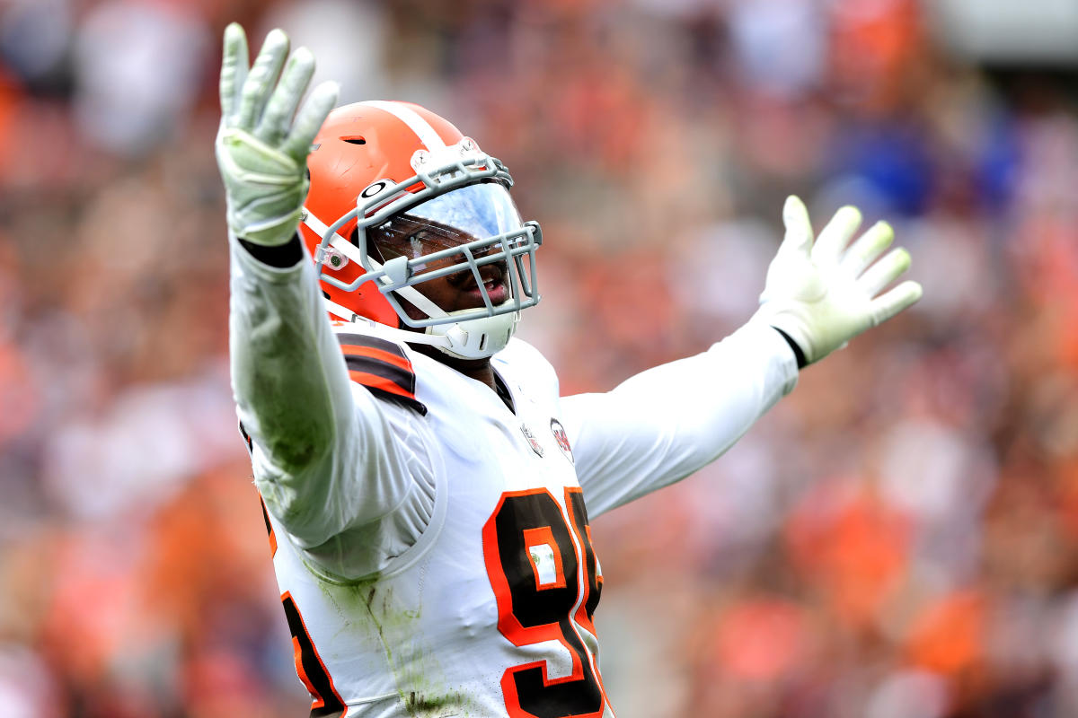 Myles Garrett Cleveland Browns Unsigned Celebrates A Sack in White Jersey Photograph