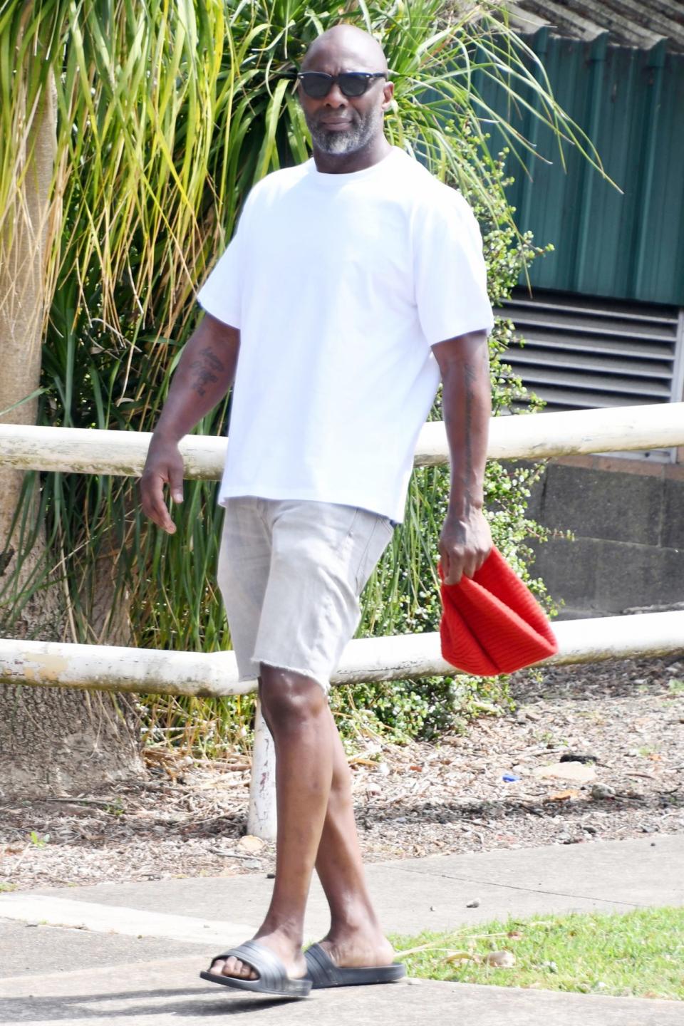 <p>Idris Elba goes for a walk on Sunday in Sydney, Australia, where he's gearing up to film <em>Three Thousand Years of Solitude.</em></p>