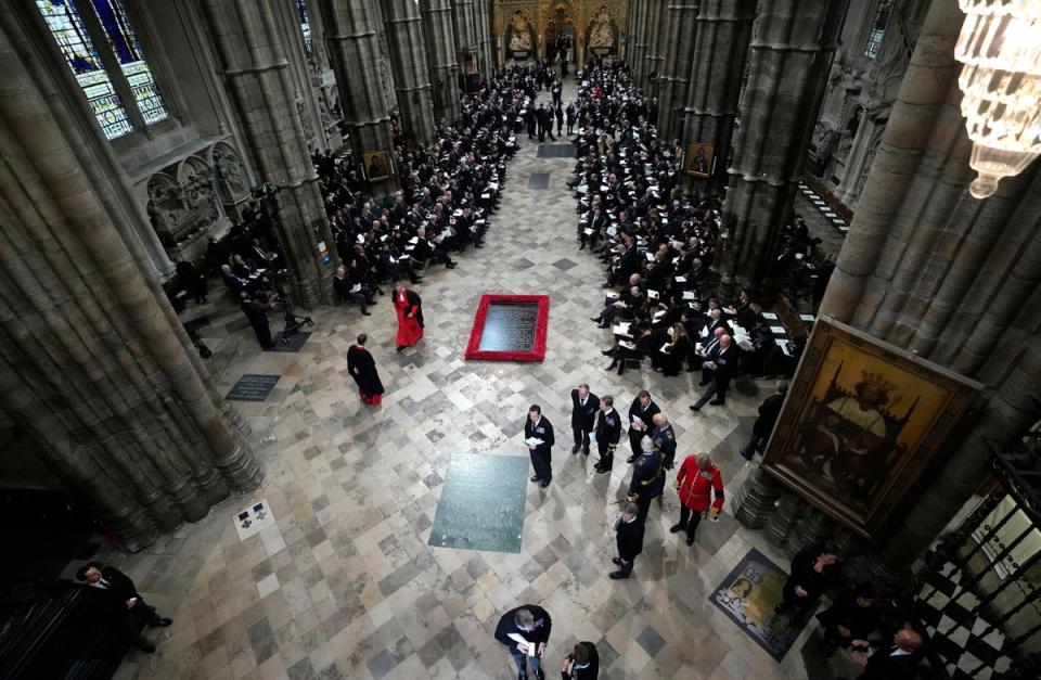 Guests and officials begin to take their places prior to the funeral service of Queen Elizabeth II at Westminster Abbey (AP)