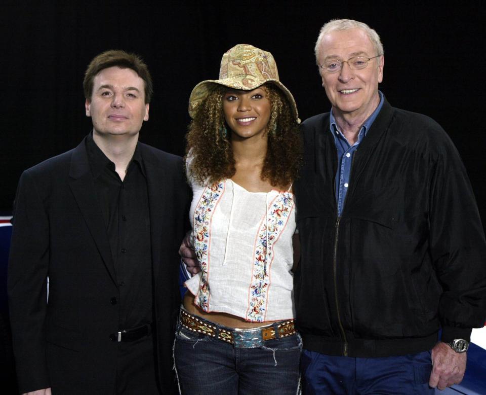 Mike Myers, Beyonce, and Michael Caine smiling