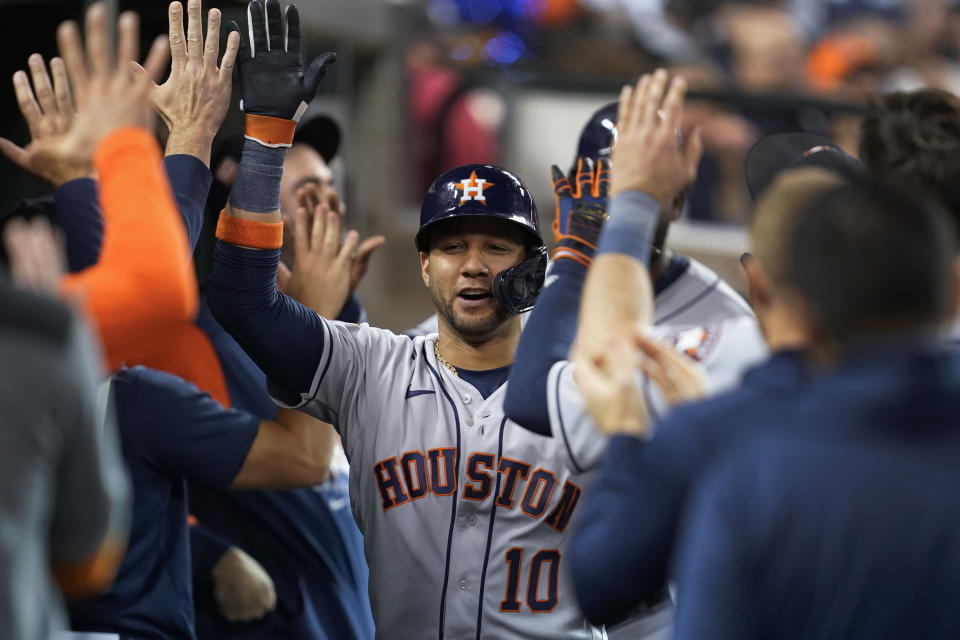 Houston Astros' Yuli Gurriel celebrates his two-run home run against the Detroit Tigers in the seventh inning of a baseball game in Detroit, Tuesday, Sept. 13, 2022. (AP Photo/Paul Sancya)