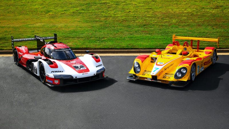 On track on the right, Porsche's 963 Hypercar in red, white and black. On the left, the winning #7 Porsche RS Spyder LMP2 car in yellow.