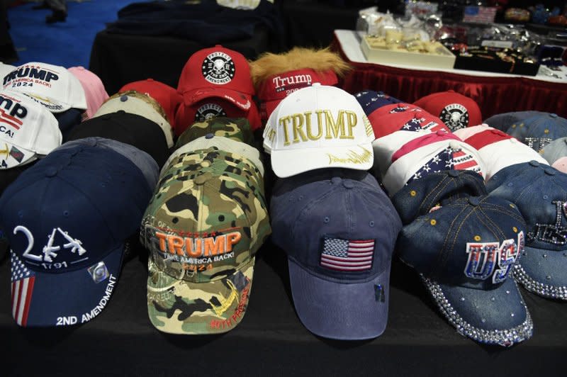Baseball caps featuring former President Donald Trump's name are for sale at the Conservative Political Action Conference on Thursday in National Harbor, Md. Photo by Mike Theiler/UPI