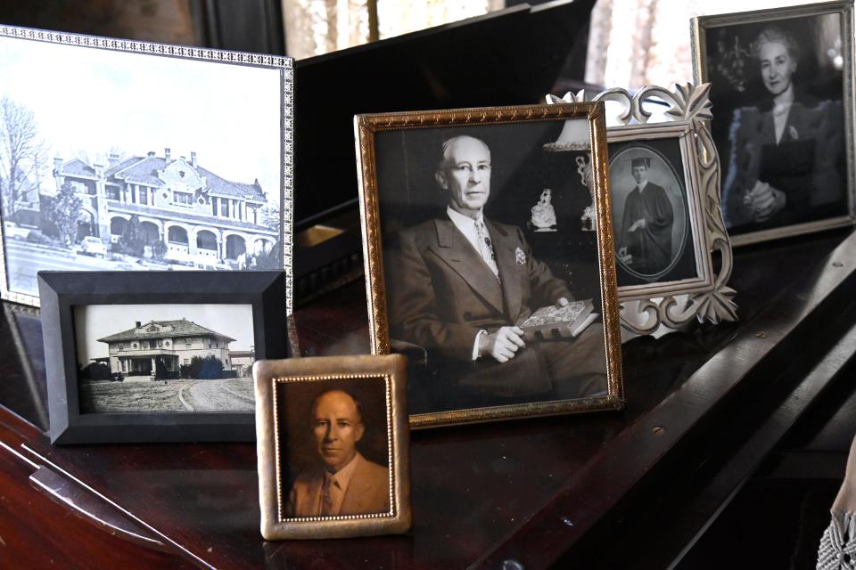 Family photographs of the Swenson family decorate the home’s original piano March 30. The 114 year-old home is an Abilene landmark.