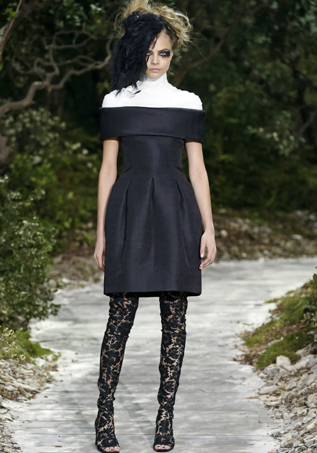 Chanel SS13: Cara Delevingne hit the runway in an off-the-shoilder fitted dress