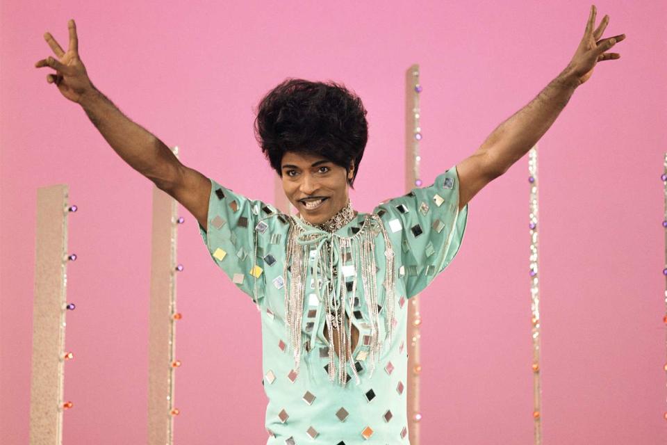 <p>Long before it was popular, Penniman was embracing androgyny, sporting his signature six-inch coif, pencil mustache and costumes — which often in part came off — on stage. <a href="https://www.rollingstone.com/music/music-features/little-richard-gay-preacher-biography-996737/" rel="nofollow noopener" target="_blank" data-ylk="slk:He spoke openly about his fluid sexuality;elm:context_link;itc:0;sec:content-canvas" class="link ">He spoke openly about his fluid sexuality</a> and look in <i>The Life and Times of Little Richard.</i></p>