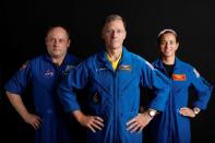 Boeing astronaut Chris Ferguson poses for a picture with NASA commercial crew astronauts and Star Liner members Nicole Mann and Mike Fincke at the Johnson Space Center in Houston