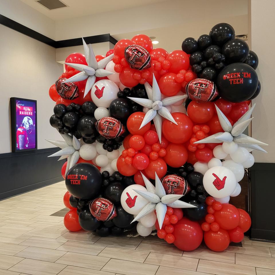 A display of balloons adorns the lobby of the Texas Tech team hotel in downtown Shreveport, Louisiana, as the Red Raiders prepare to play California on Saturday in the Independence Bow.