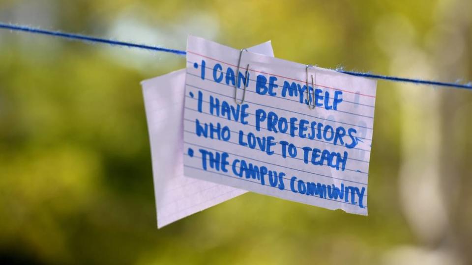 Notes written by New College of Florida students stating why they love their school hang on a string of blue yarn in front of the Cook Library. Stidents were protesting Gov. Ron DeSantis’ appointment of six conservative members to the school’s board of trustees in January.