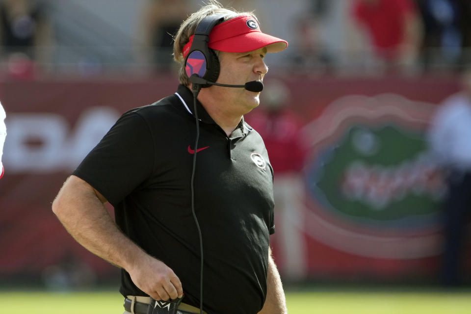 Georgia head coach Kirby Smart walks on the field during a timeout during the first half of an NCAA college football game against Florida, Saturday, Oct. 28, 2023, in Jacksonville, Fla. (AP Photo/John Raoux)